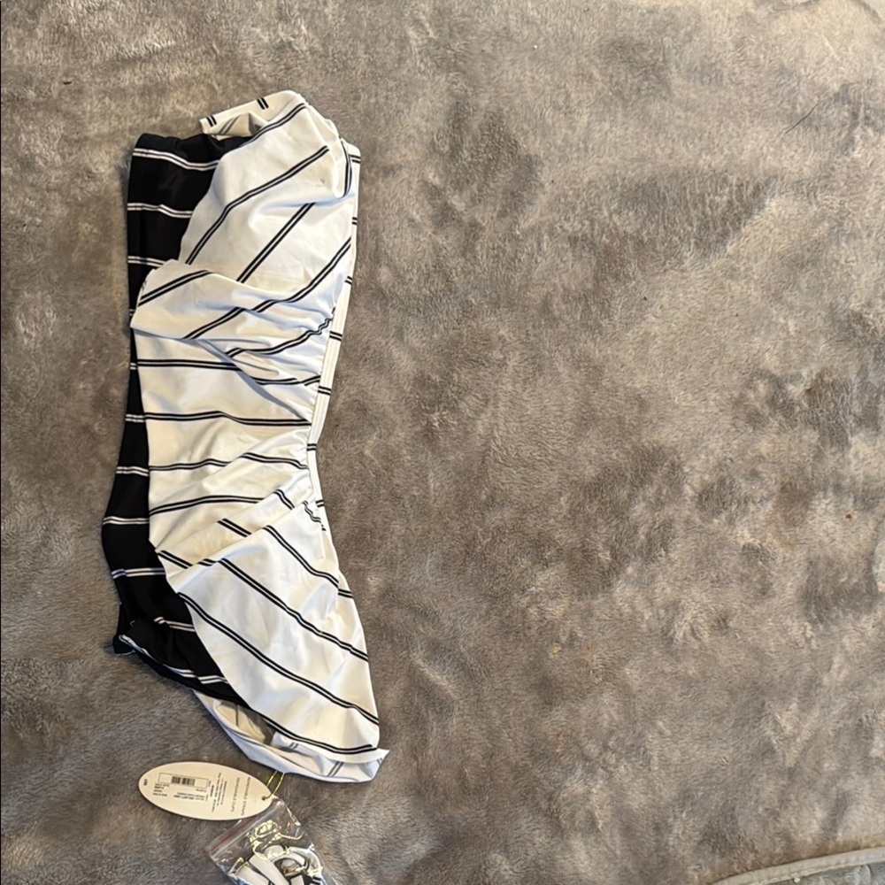 Ruffle swim top. NWT.